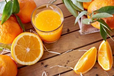 wsi imageoptim bigstock Orange Juice On A Wooden Table 115421468